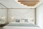 Кровать или кровати в номере Mayia Exclusive Resort & Spa - Adults Only