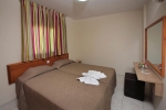 Кровать или кровати в номере Nelia Gardens