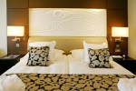 Кровать или кровати в номере Amathus Beach Hotel Limassol