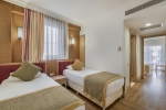 Кровать или кровати в номере Alva Donna Exclusive Hotel & Spa