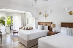 Кровать или кровати в номере Paradisus Palma Real Golf & Spa Resort