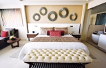 Кровать или кровати в номере Hideaway at Royalton Riviera Cancun All Inclusive-Adults Only