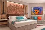Кровать или кровати в номере Hilton La Romana, an All-Inclusive Family Resort