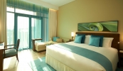 Кровать или кровати в номере Sofitel The Palm, Дубай, Курорт и Спа