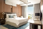 Кровать или кровати в номере Jumeirah at Saadiyat Island Resort