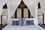 Кровать или кровати в номере The Ritz-Carlton Ras Al Khaimah, Al Hamra Beach