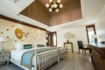Кровать или кровати в номере Maikhao Dream Villa Resort and Spa, Centara Boutique Collection