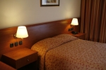 Кровать или кровати в номере Blue Dolphin Hotel