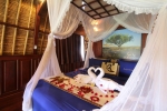 Кровать или кровати в номере Kupu Kupu Barong Villas and Tree Spa by L’OCCITANE