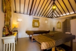 Кровать или кровати в номере Keraton Jimbaran Resort
