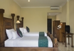 Кровать или кровати в номере Ayung Resort Ubud