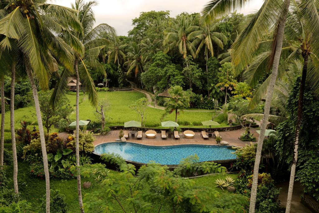 Вид на бассейн в Plataran Ubud Hotel & Spa или окрестностях