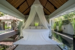 Кровать или кровати в номере Kayumanis Nusa Dua Private Villa & Spa 
