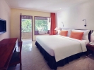 Кровать или кровати в номере Mercure Resort Sanur
