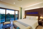 Кровать или кровати в номере Mercury Phu Quoc Resort & Villas