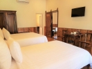 Кровать или кровати в номере Elwood Resort Phu Quoc