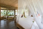 Кровать или кровати в номере An Lam Retreats Ninh Van Bay