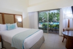Кровать или кровати в номере Impressive Resort & Spa Punta Cana