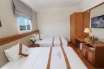 Кровать или кровати в номере Dendro Hotel