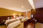 Кровать или кровати в номере Muong Thanh Grand Nha Trang Hotel