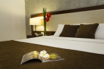 Кровать или кровати в номере Starlet Hotel