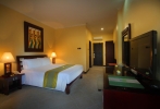 Кровать или кровати в номере Adi Dharma Hotel