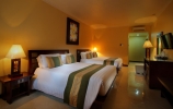 Кровать или кровати в номере Adi Dharma Hotel
