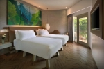 Кровать или кровати в номере Mercure Kuta Bali