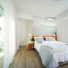 Кровать или кровати в номере Atrium Ambiance Hotel