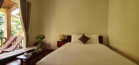 Кровать или кровати в номере Homestead Phu Quoc Resort (Paradise Resort Phu Quoc)