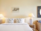 Кровать или кровати в номере Grecotel La Riviera & Aqua Park