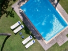 Вид на бассейн в Grecotel La Riviera & Aqua Park или окрестностях