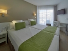 Кровать или кровати в номере BQ Amfora Beach Adults Only Hotel +18