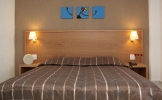 Кровать или кровати в номере Europa Beach Hotel