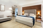 Кровать или кровати в номере Nana Princess Suites Villas & Spa