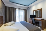 Кровать или кровати в номере Gaia Royal