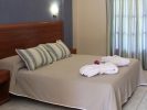 Кровать или кровати в номере Gelina Village & Aqua Park