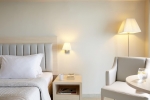 Кровать или кровати в номере Mayor La Grotta Verde Grand Resort - Adults Only