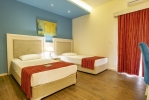 Кровать или кровати в номере Queen's Park Goynuk Hotel - All Inclusive