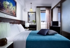 Кровать или кровати в номере Albatros Spa & Resort Hotel