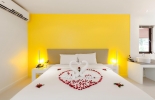 Кровать или кровати в номере The Phulin Resort by Tuana Group
