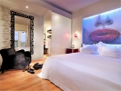 Кровать или кровати в номере Out Of The Blue Capsis Elite Resort