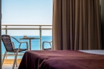 Кровать или кровати в номере Pegasos Beach Hotel