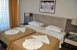 Кровать или кровати в номере Faustina Hotel & Spa