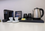 Принадлежности для чая и кофе в Eva Mare Hotel & Suites - Adults only
