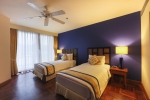 Кровать или кровати в номере Laguna Holiday Club Phuket Resort