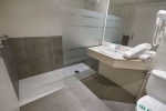 Ванная комната в Hotel Gran Garbi & AquasPlash
