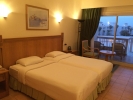 Кровать или кровати в номере Hurghada Long Beach Resort