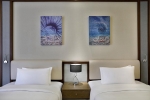 Кровать или кровати в номере Hilton Hurghada Plaza Hotel