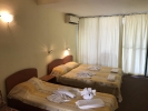 Кровать или кровати в номере Hotel Nimfa-Rusalka